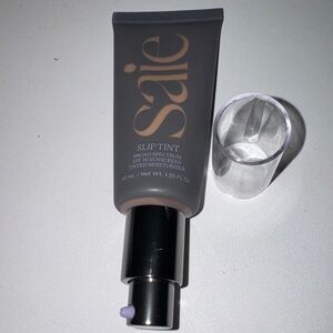 Saie Slip Tint Tinted Moisturizer SPF 35 - Gray and Black